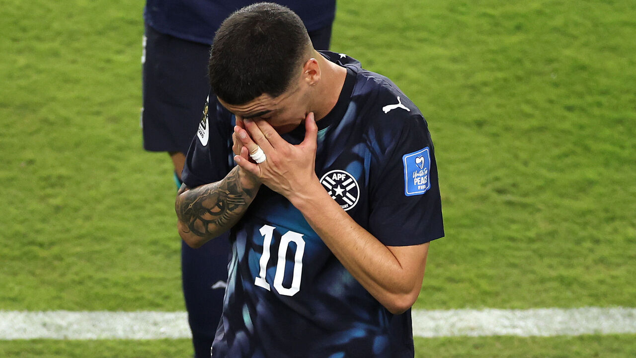 SANTA CLARA, CALIFORNIA - JUNE 19: Miguel Almiron #10 of Paraguay reacts after receiving a red card for covering his mouth while talking to another player during the FIFA World Cup 2026 Group D match between Türkiye and Paraguay at San Francisco Bay Area Stadium on June 19, 2026 in Santa Clara, California.