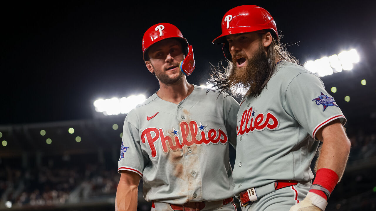 WASHINGTON, DC - JUNE 23: Brandon Marsh #16 of the Philadelphia Phillies celebrates with Trea Turner #7 after hitting a two-run home run against the Washington Nationals during the ninth inning at Nationals Park on June 23, 2026 in Washington, DC.