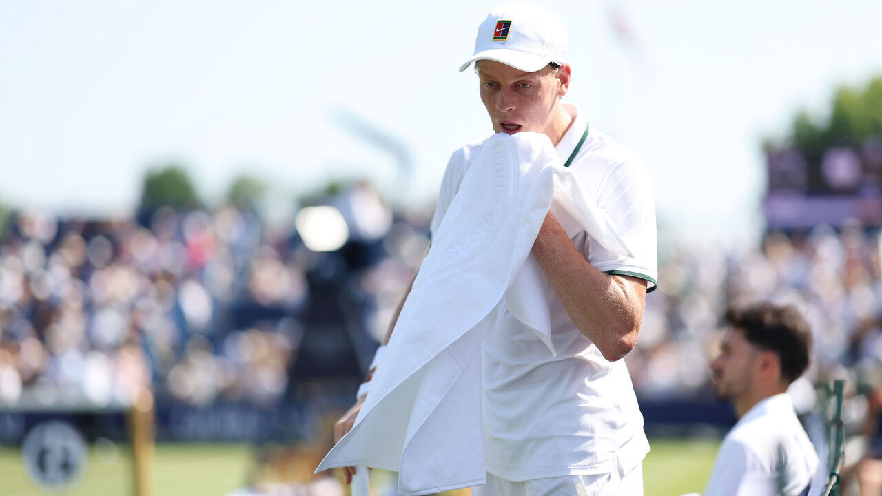 LONDON, ENGLAND - JUNE 24: Jannik Sinner of Italy wipes his face with a towel during his exhibition match against Cameron Norrie of Great Britain during the Giorgio Armani Tennis Classic at The Hurlingham Club on June 24, 2026 in London, England.