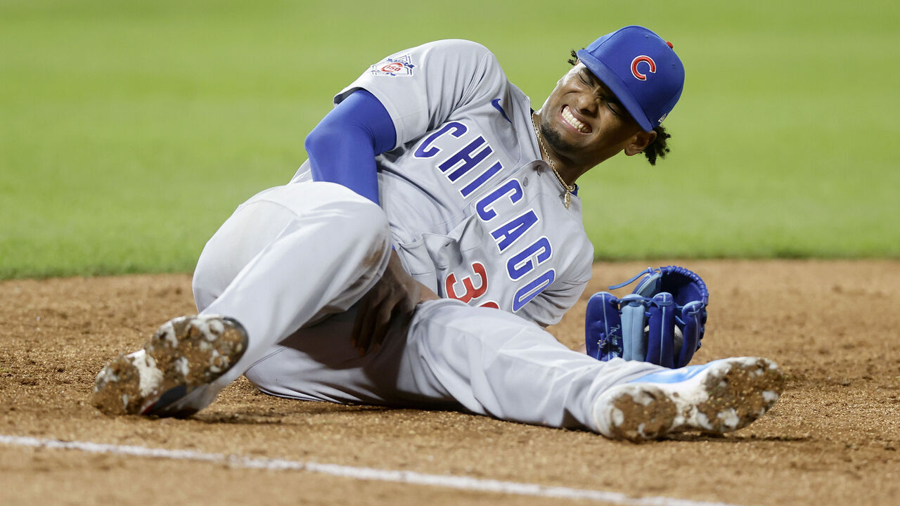 NEW YORK, NEW YORK - JUNE 23: Edward Cabrera #30 of the Chicago Cubs reacts after an injury while making a play getting the final out of the fifth inning at first base against the New York Mets at Citi Field on June 23, 2026 in New York City.