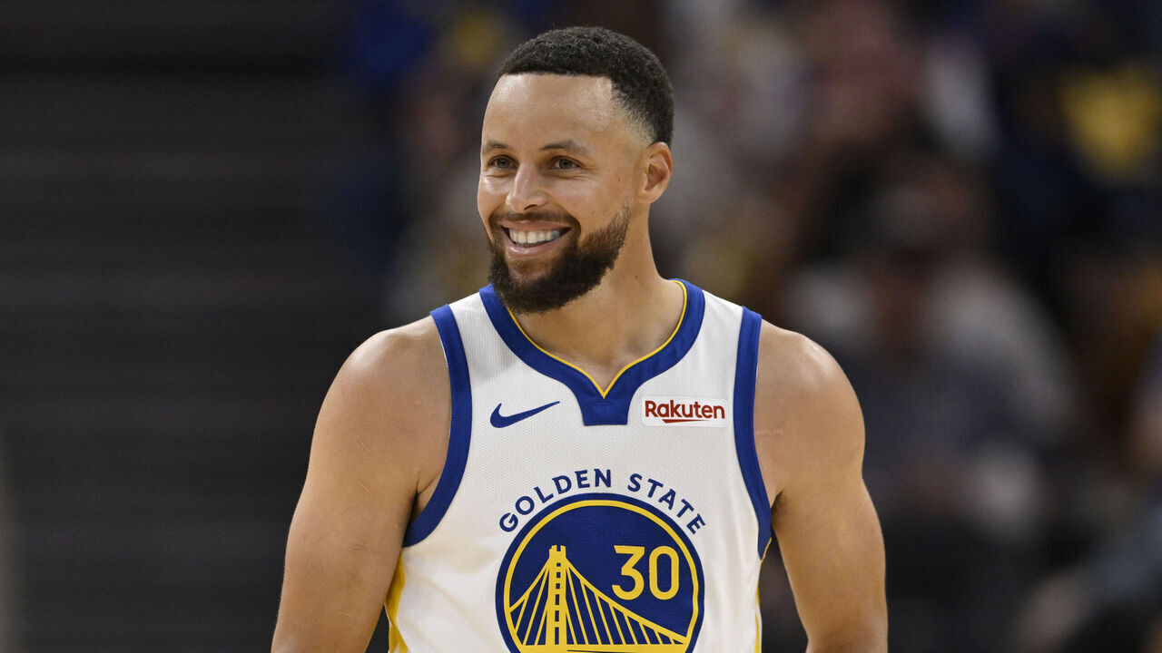 SAN FRANCISCO, CALIFORNIA - APRIL 05: Stephen Curry #30 of the Golden State Warriors smiles against the Houston Rockets in the second quarter at Chase Center on April 05, 2026 in San Francisco, California.