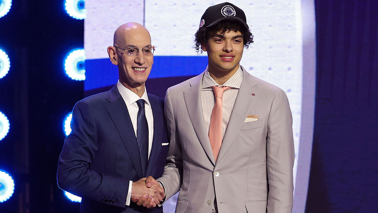 NEW YORK, NEW YORK - JUNE 23: NBA commissioner Adam Silver shakes hands with Keaton Wagler after he is drafted fifth overall by the Los Angeles Clippers during Round One of the 2026 NBA Draft at Barclays Center on June 23, 2026 in New York City.