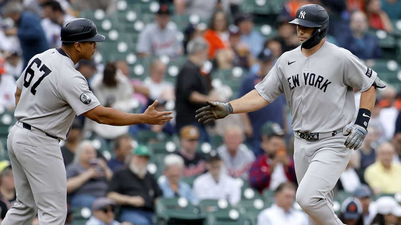 DETROIT, MI - JUNE 24: Paul Goldschmidt #48 of the New York Yankees celebrates his solo home run with third base coach Luis Rojas #67 in the first inning against the Detroit Tigers at Comerica Park on June 24, 2026 in Detroit, Michigan.