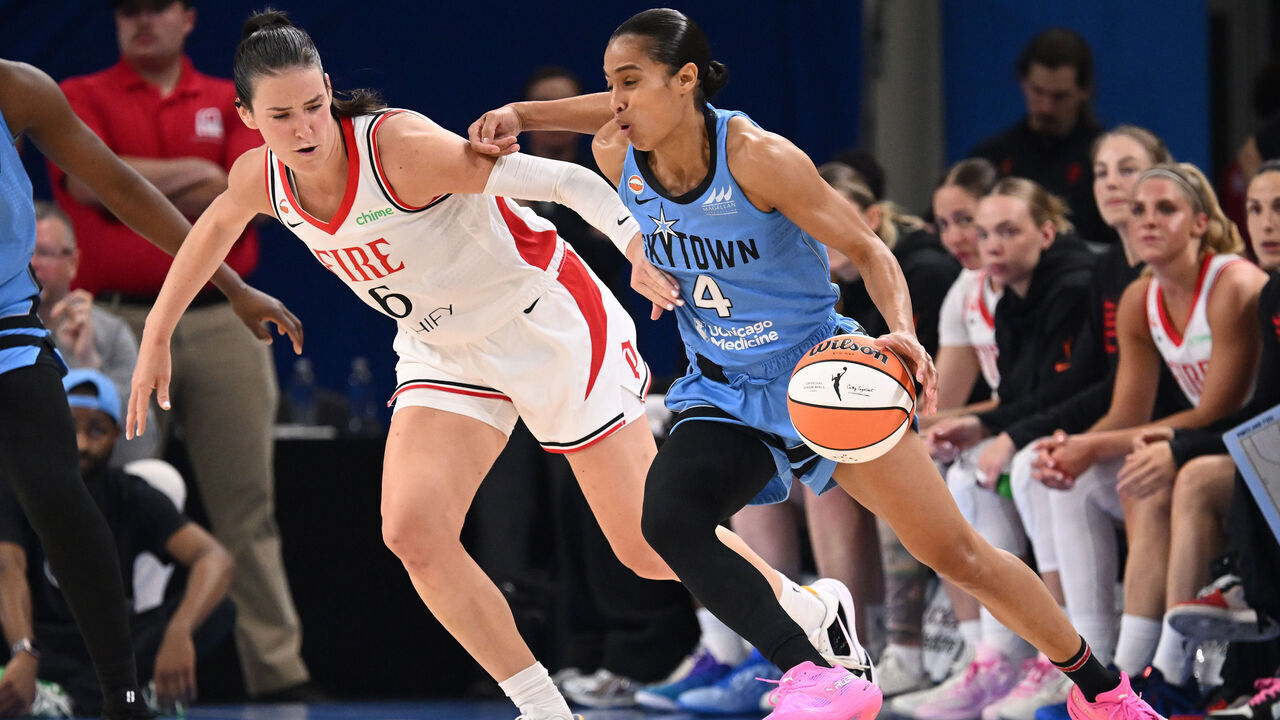 CHICAGO, ILLINOIS - JUNE 24: Skylar Diggins #4 of the Chicago Sky dribbles the ball as Bridget Carleton #6 of the Portland Fire defends during the second half at Wintrust Arena on June 24, 2026 in Chicago, Illinois.
