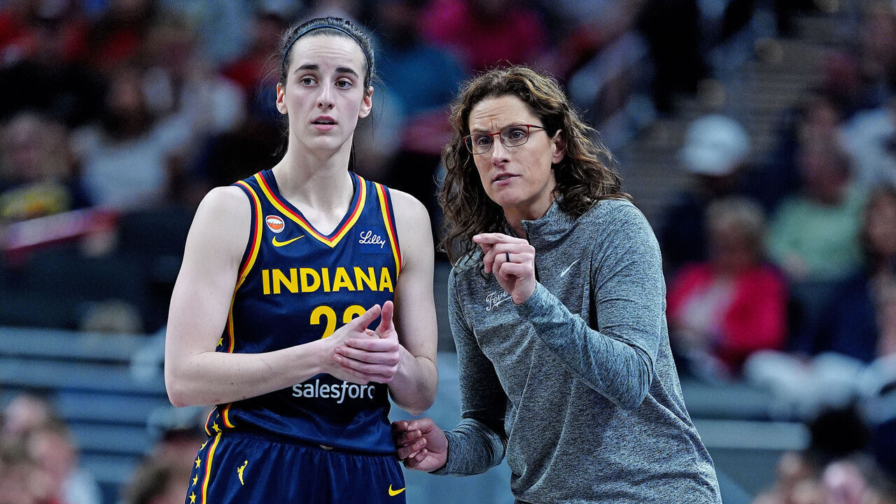 INDIANAPOLIS, IN - JUNE 22: Indiana Fever coach Stephanie White talks to guard Caitlin Clark (22) during a game against the Phoenix Mercury on June 22, 2026, at Gainbridge Fieldhouse in Indianapolis, Indiana.