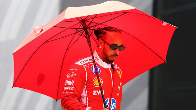 SPIELBERG, AUSTRIA - JUNE 25: Lewis Hamilton of Great Britain and Scuderia Ferrari walks in the Paddock during previews ahead of the F1 Grand Prix of Austria at Red Bull Ring on June 25, 2026 in Spielberg, Austria.