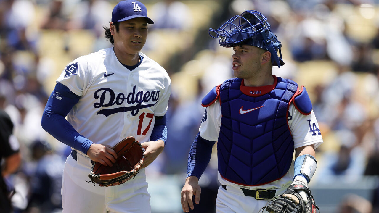 LOS ANGELES, CALIFORNIA - JUNE 17: Shohei Ohtani #17 of the Los Angeles Dodgers talks with Dalton Rushing #68 during the fourth inning of a baseball game against the Tampa Bay Rays at Dodger Stadium on June 17, 2026 in Los Angeles, California.