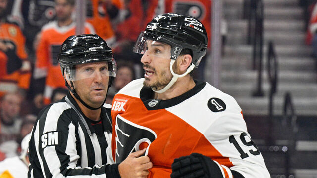 PHILADELPHIA , PA - APRIL 22: Philadelphia Flyers right wing Garnet Hathaway #19 is restrained by a referee during game three of the Stanley Cup Playoffs First Round between the Philadelphia Flyers and the Pittsburg Penguins on April 22nd, 2026 at the Xfinity Mobile Arena in Philadelphia, PA.
