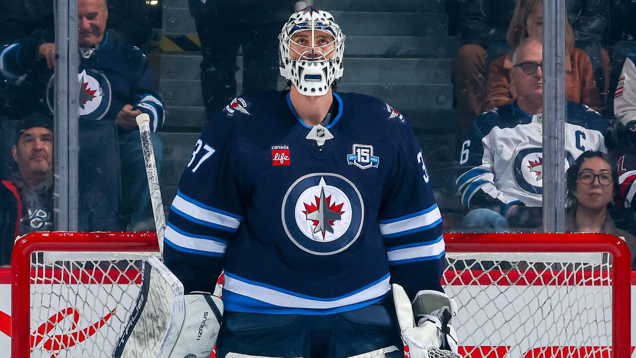 WINNIPEG, CANADA - APRIL 11: Goaltender Connor Hellebuyck #37 of the Winnipeg Jets looks on from his crease prior to NHL action against the Philadelphia Flyers at Canada Life Centre on April 11, 2026 in Winnipeg, Manitoba, Canada.