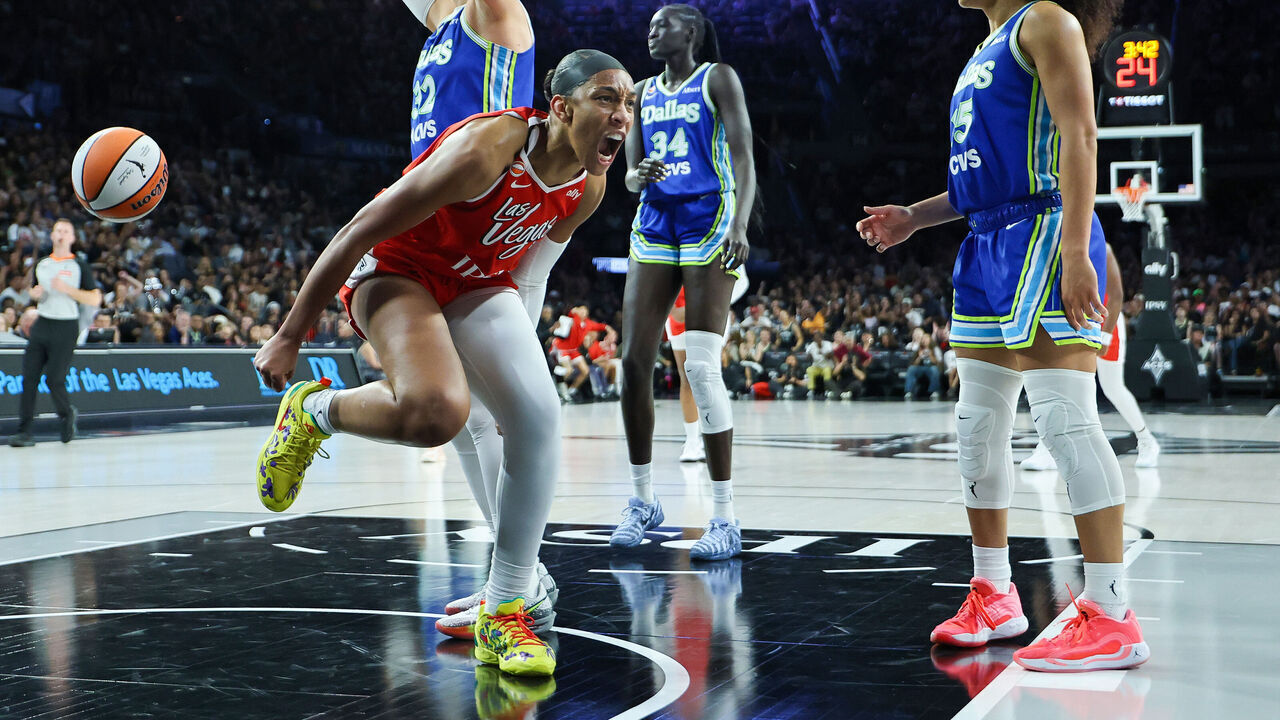 LAS VEGAS, NEVADA - JUNE 25: A'ja Wilson #22 of the Las Vegas Aces reacts after scoring a basket and drawing a foul against Jessica Shepard #32 of the Dallas Wings in the second quarter of their game at Michelob ULTRA Arena on June 25, 2026 in Las Vegas, Nevada.