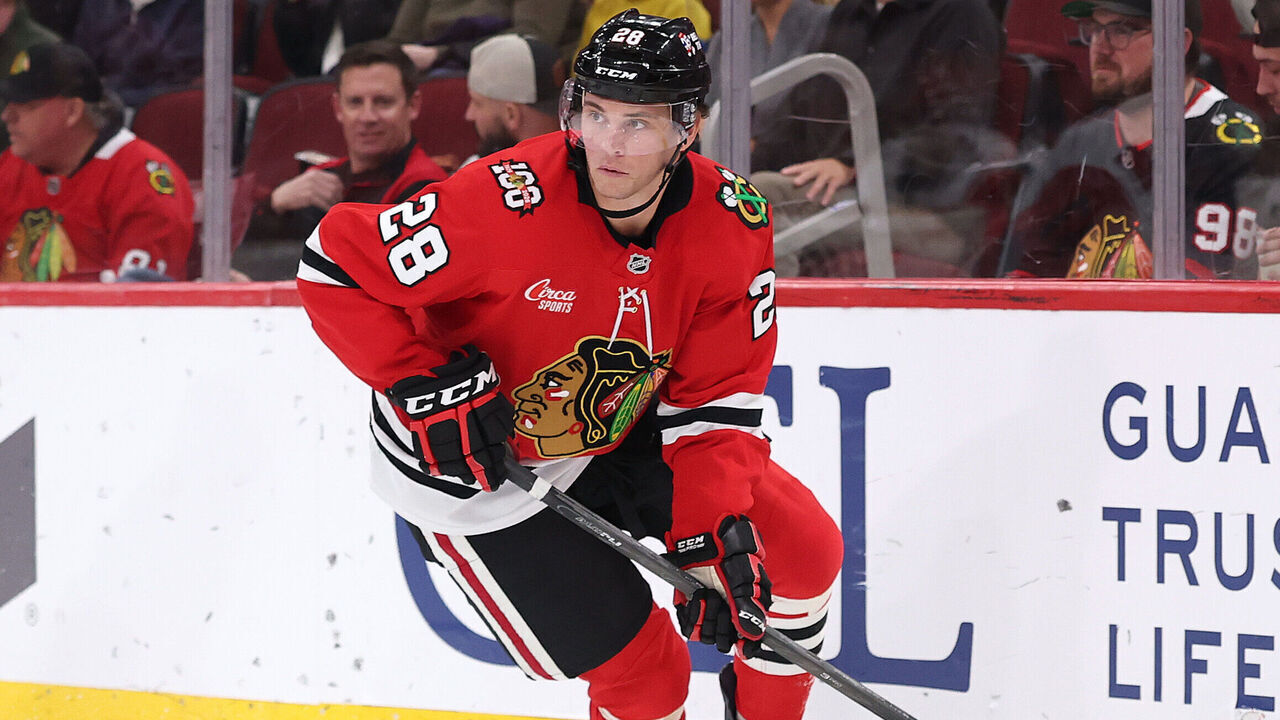 CHICAGO, ILLINOIS - APRIL 09: Andre Burakovsky #28 of the Chicago Blackhawks skates with the puck against the Carolina Hurricanes during the second period at the United Center on April 09, 2026 in Chicago, Illinois.