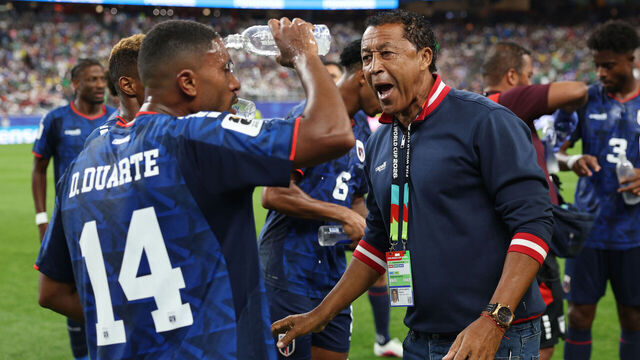 HOUSTON, TEXAS - JUNE 26: Bubista, Head Coach of Cabo Verde, speaks with Deroy Duarte #14 and teammates during the FIFA World Cup 2026 Group H match between Cabo Verde and Saudi Arabia at Houston Stadium on June 26, 2026 in Houston, Texas.