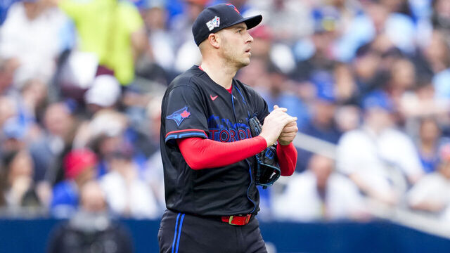 TORONTO, CANADA - JUNE 26: Patrick Corbin #46 of the Toronto Blue Jays looks on in a break in play against the Texas Rangers during the first inning in their MLB game at the Rogers Centre on June 26, 2026 in Toronto, Ontario, Canada.