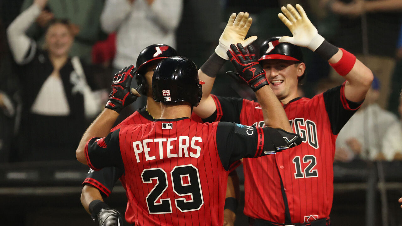 CHICAGO, ILLINOIS - JUNE 26: Tristan Peters #29 of the Chicago White Sox celebrates his grand slam with teammates Colson Montgomery #12 and Braden Montgomery #24 during the sixth inning against the Kansas City Royals at Rate Field on June 26, 2026 in Chicago, Illinois.