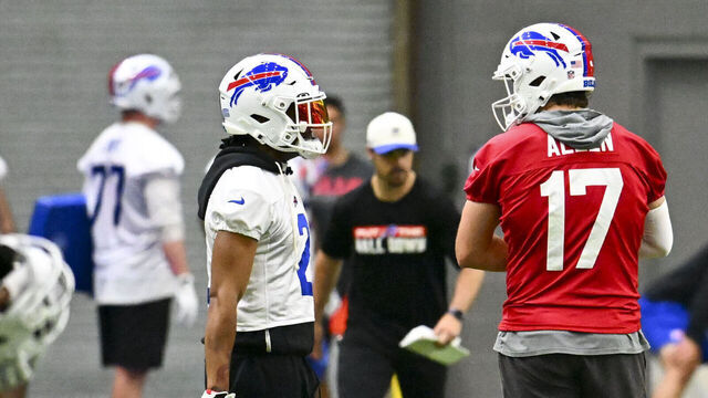 ORCHARD PARK, NEW YORK - JUNE 9: Josh Allen #17 talks with DJ Moore #2 during the Buffalo Bills mandatory minicamp at Kaleida Health Performance Center on June 9, 2026 in Orchard Park, New York.