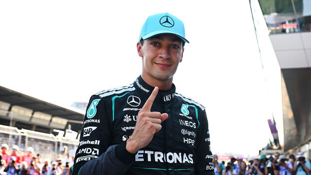 SPIELBERG, AUSTRIA - JUNE 27: Pole position qualifier George Russell of Great Britain and Mercedes AMG Petronas F1 Team celebrates in parc ferme during qualifying ahead of the F1 Grand Prix of Austria at Red Bull Ring on June 27, 2026 in Spielberg, Austria.