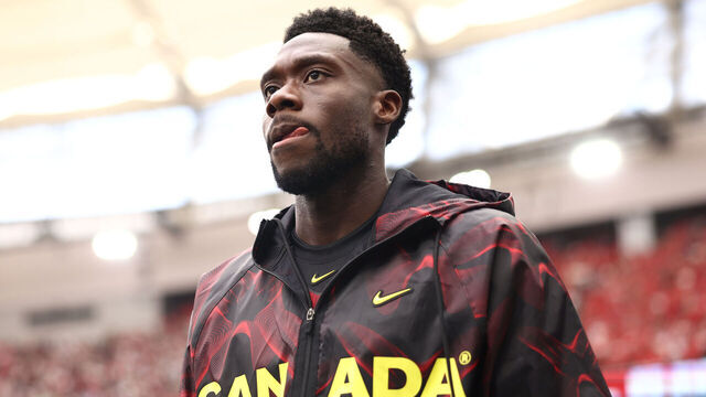 VANCOUVER, BRITISH COLUMBIA - JUNE 18: Alphonso Davies #19 of Canada walks into the pitch before the FIFA World Cup 2026 Group B match between Canada and Qatar at BC Place Vancouver on June 18, 2026 in Vancouver, British Columbia.
