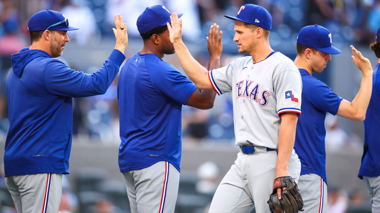 TORONTO, CANADA - JUNE 27: Corey Seager #5 of the Texas Rangers celebrate with teammates after their MLB game against the Toronto Blue Jays at Rogers Centre on June 27, 2026 in Toronto, Canada.