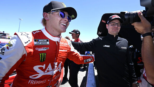 SONOMA, CA - JUNE 27: Ty Gibbs (#54 Joe Gibbs Racing Saia Freight + Logistics Toyota) is congratulated by a crew member after capturing the pole for the NASCAR Cup Series Toyota/Save Mart 350 on June 27, 2026, at Sonoma Raceway in Sonoma, CA.