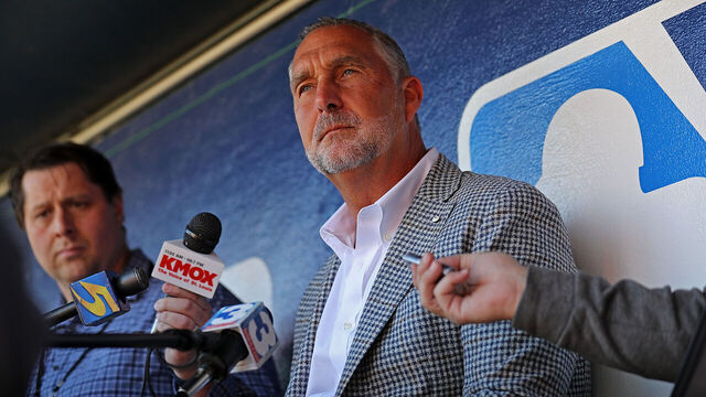 MEMPHIS, TENNESSEE - MARCH 24: John Mozeliak, president of baseball operations of the St. Louis Cardinals answers questions from the media before the spring training game against the Memphis Redbirds at AutoZone Park on March 24, 2025 in Memphis, Tennessee.