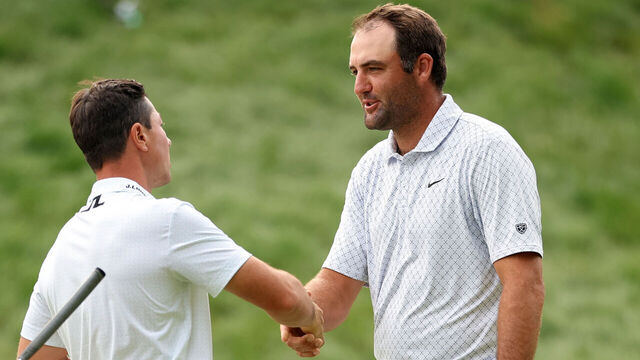 CROMWELL, CONNECTICUT - JUNE 27: Viktor Hovland of Norway (L) and Scottie Scheffler of the United States shake hands on the 18th green after finishing their round during the third round of the Travelers Championship 2026 at TPC River Highlands on June 27, 2026 in Cromwell, Connecticut.
