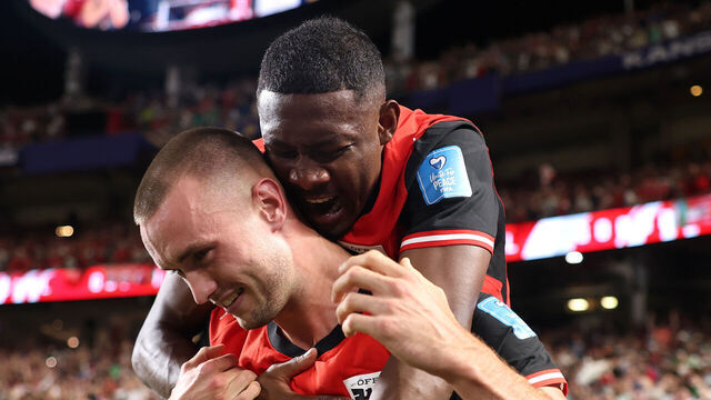 KANSAS CITY, MISSOURI - JUNE 27: Sasa Kalajdzic #14 of Austria celebrates with David Alaba #8 after scoring the team's third goal during the FIFA World Cup 2026 Group J match between Algeria and Austria at Kansas City Stadium on June 27, 2026 in Kansas City, Missouri.