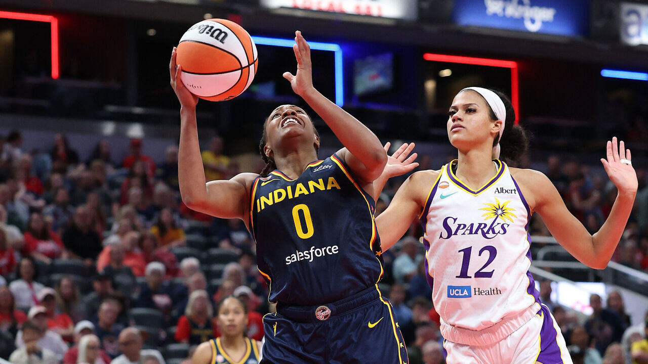 INDIANAPOLIS, INDIANA - JUNE 27: Kelsey Mitchell #0 of the Indiana Fever shoots the ball against the Los Angeles Sparks at Gainbridge Fieldhouse on June 27, 2026 in Indianapolis, Indiana. NOTE TO USER: User expressly acknowledges and agrees that, by downloading and or using this photograph, User is consenting to the terms and conditions of the Getty Images License