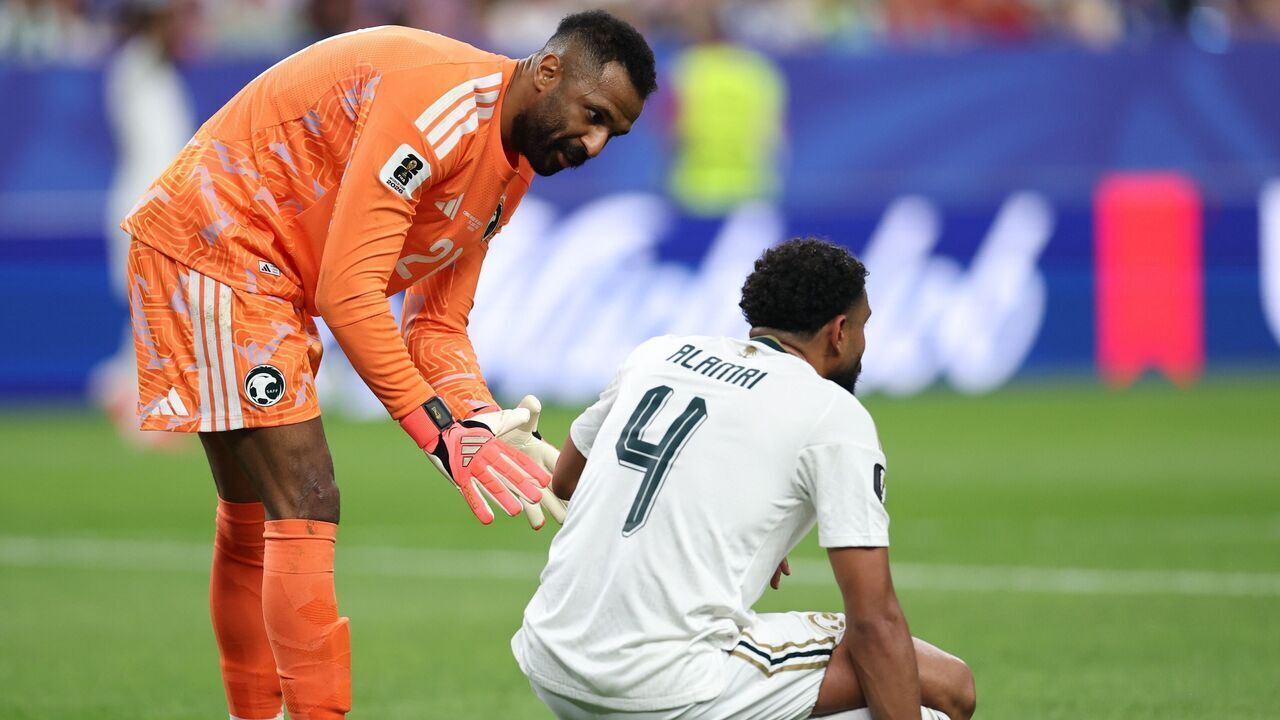 Saudi Arabia's goalkeeper Mohammed Alowais L talks with Abdulelah Alamri during the group H match between Cabo Verde and Saudi Arabia at the 2026 FIFA World Cup at Houston Stadium in Houston, the United States, June 26, 2026.