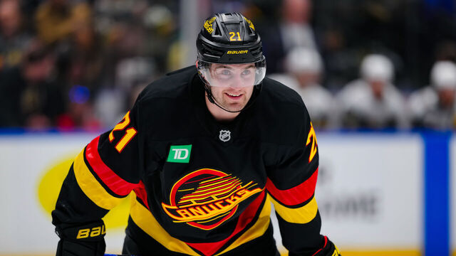 VANCOUVER, CANADA - APRIL 7: Nils Hoglander #21 of the Vancouver Canucks looks on during the first period of their NHL game against the Vegas Golden Knights at Rogers Arena on April 7, 2026 in Vancouver, British Columbia, Canada.