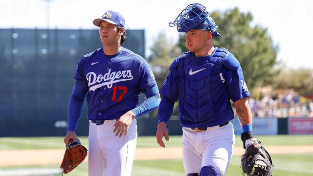 GLENDALE, ARIZONA - MARCH 18: Shohei Ohtani (L) #17 of the Los Angeles Dodgers walks back to the dugout with Dalton Rushing #68 in the fourth inning during a Spring Training game against the San Francisco Giants at Camelback Ranch on March 18, 2026 in Glendale, Arizona.