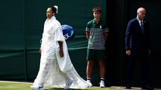 Japan's Naomi Osaka arrives ahead of her women's singles first round tennis match on the first day of the 2026 Wimbledon Championships at The All England Lawn Tennis and Croquet Club in Wimbledon, southwest London, on June 29, 2026. / RESTRICTED TO EDITORIAL USE