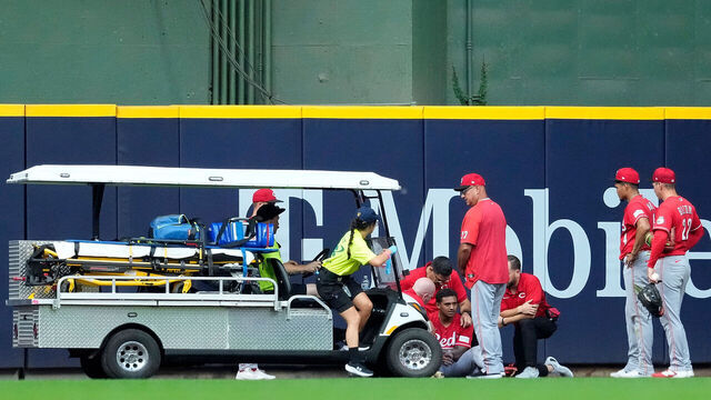 MILWAUKEE, WISCONSIN - JUNE 29: Dane Myers #17 of the Cincinnati Reds is carted off the field after an injury making a catch at the wall in the fourth inning \amb at American Family Field on June 29, 2026 in Milwaukee, Wisconsin.