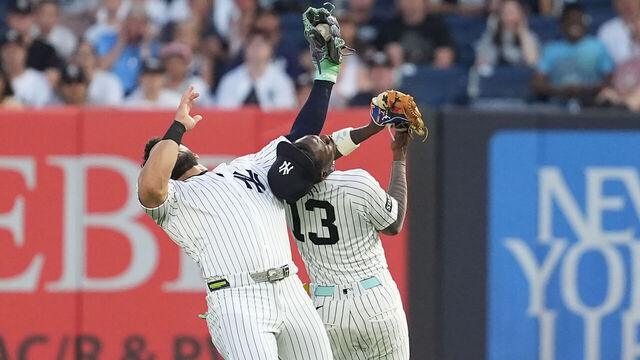 BRONX, NY - JUNE 29: New York Yankees Right Fielder Jasson Dominguez (24) catches a fly ball and collides with New York Yankees Second Baseman Jazz Chisholm Jr. (13) during the fourth inning of a Major League Baseball game between the Detroit Tigers and the New York Yankees on June 29, 2026, at Yankee Stadium in The Bronx, NY.