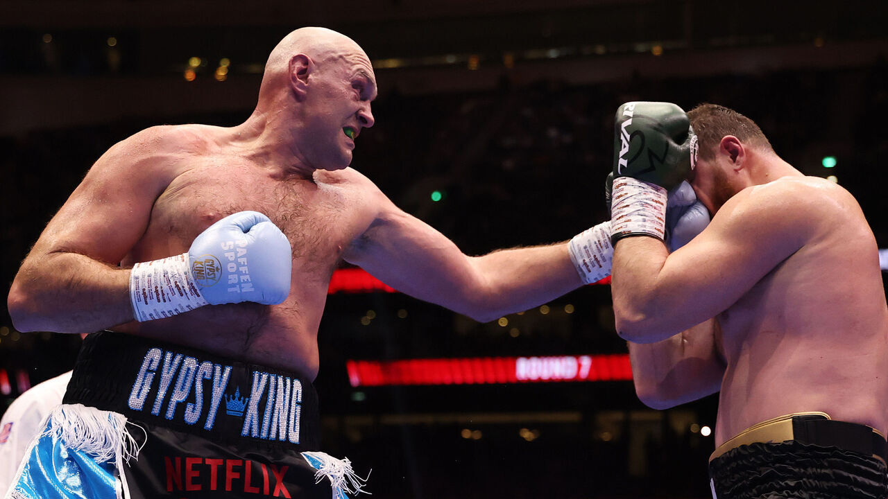 LONDON, ENGLAND - APRIL 11: Tyson Fury punches Arslanbek Makhmudov during the Heavyweight fight between Tyson Fury and Arslanbek Makhmudov at Tottenham Hotspur Stadium on April 11, 2026 in London, England.