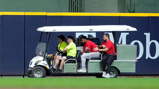 MILWAUKEE, WISCONSIN - JUNE 29: Dane Myers #17 of the Cincinnati Reds is carted off the field after an injury making a catch at the wall in the fourth inning \amb at American Family Field on June 29, 2026 in Milwaukee, Wisconsin.