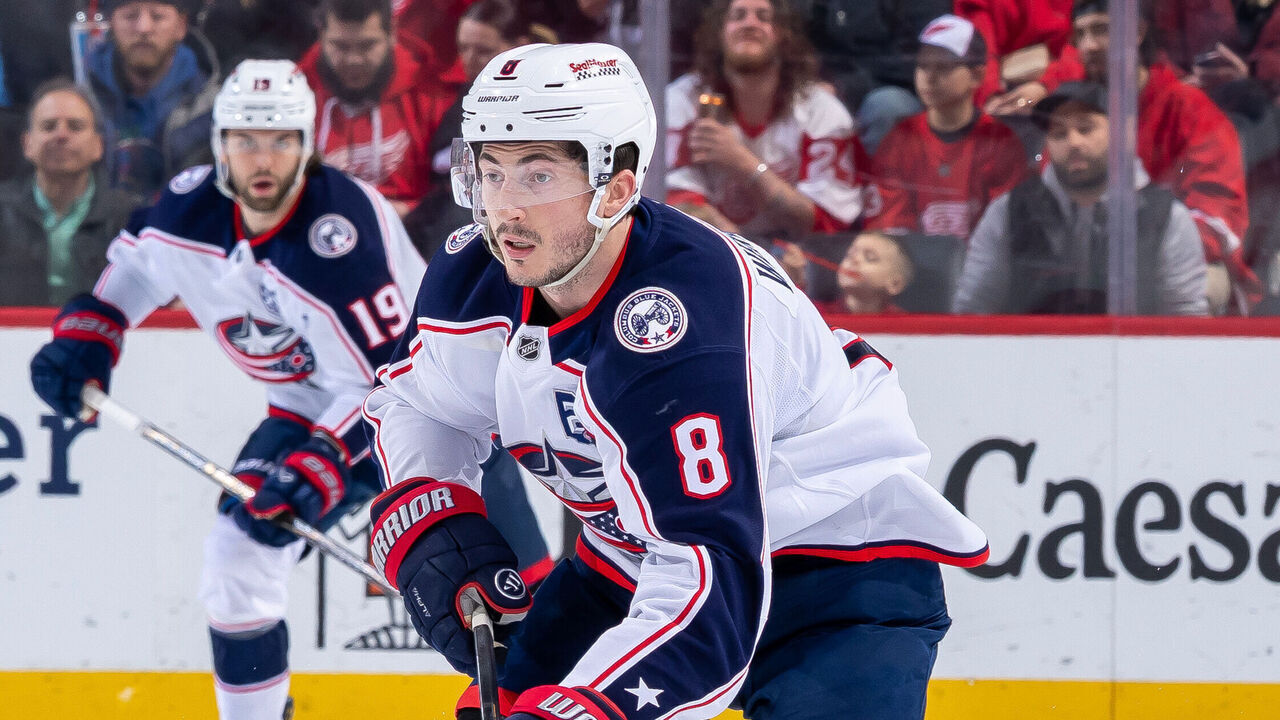 DETROIT, MICHIGAN - APRIL 07: Zach Werenski #8 of the Columbus Blue Jackets skates up ice with the puck against the Detroit Red Wings during the second period at Little Caesars Arena on April 7, 2026 in Detroit, Michigan.