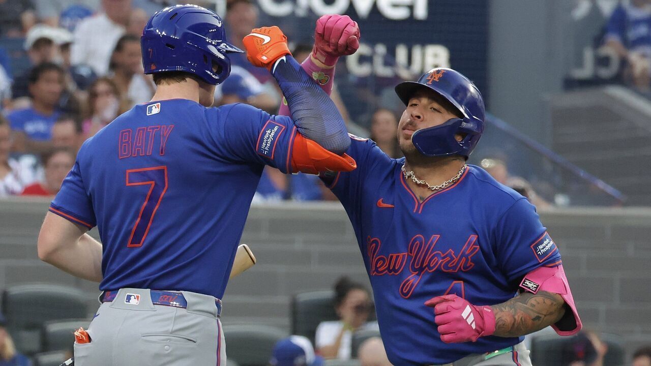 TORONTO, ON- JUNE 30 - Brett Baty #7 of the New York Mets congratulates Francisco Alvarez #4 of the New York Mets after hitting a home run in the fifth inning as the Toronto Blue Jays play the New York Mets at Rogers Centre in Toronto. June 30, 2026. Steve Russell/Toronto Star (Steve Russell/Toronto Star via Getty Images)