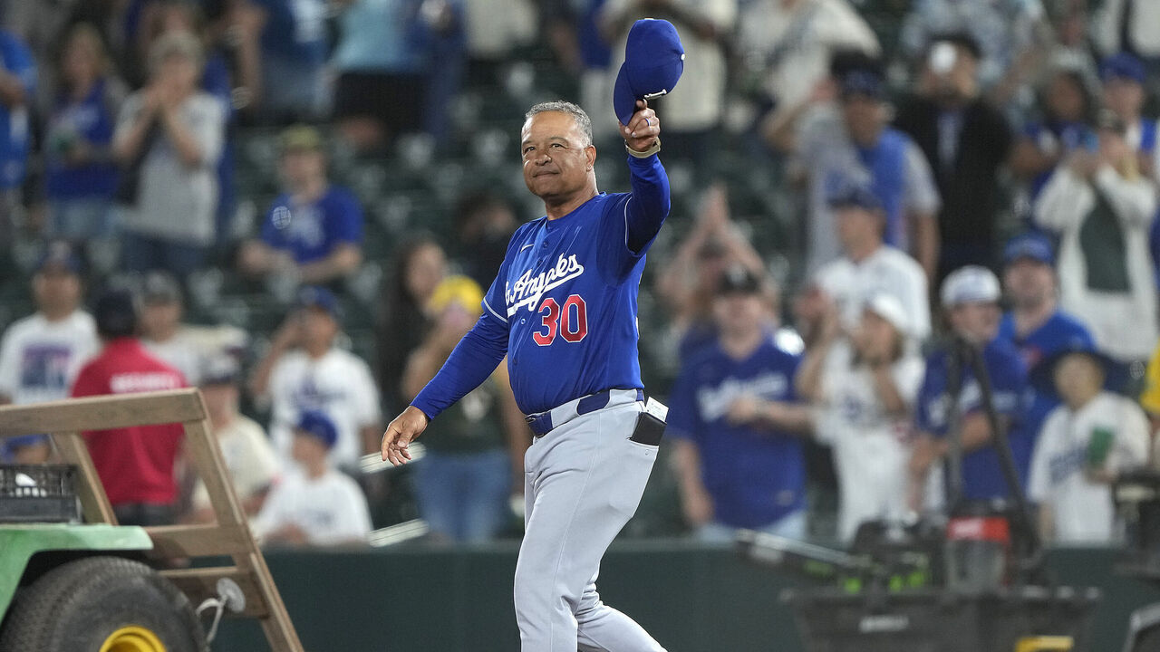SACRAMENTO, CALIFORNIA - JUNE 30: Manager Dave Roberts #30 of the Los Angeles Dodgers salutes the fans has he walks off the field after the Dodgers defeated the Athletics 9-3 at Sutter Health Park on June 30, 2026 in Sacramento, California. The victory was Roberts's 1000th has a manager.