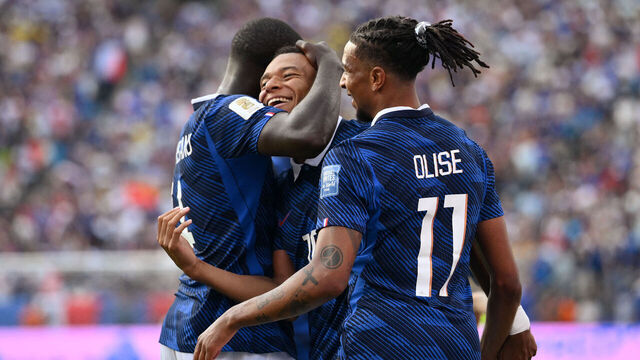 TOPSHOT - France's forward #10 Kylian Mbappe celebrates scoring his team's third goal with forward #11 Michael Olise (R) during the 2026 World Cup round of 32 football match between France and Sweden at the New York/New Jersey Stadium in East Rutherford on June 30, 2026.