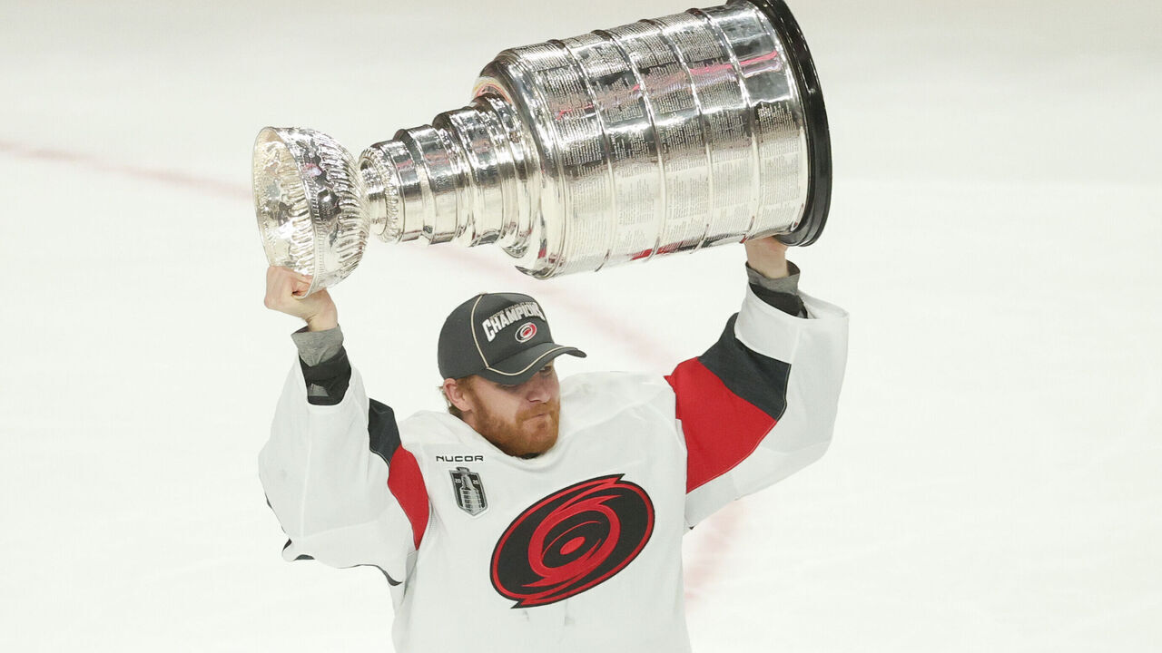 LAS VEGAS, NEVADA - JUNE 14: Frederik Andersen #31 of the Carolina Hurricanes lifts the Stanley Cup after his team's 3-0 series clinching victory against the Vegas Golden Knights in Game Six of the 2026 Stanley Cup Final at T-Mobile Arena on June 14, 2026 in Las Vegas, Nevada.