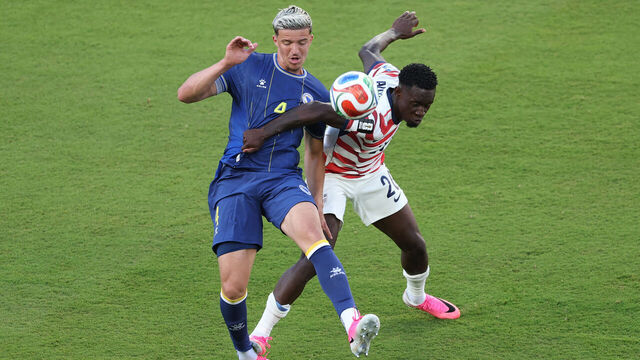 SANTA CLARA, CALIFORNIA - JULY 01: Folarin Balogun #20 of the United States fouls Tarik Muharemovic #4 of Bosnia and Herzegovina which is later reviewed by VAR and awarded as a red card foul a during the FIFA World Cup 2026 Round of 32 match between USA and Bosnia and Herzegovina at San Francisco Bay Area Stadium on July 01, 2026 in Santa Clara, California.