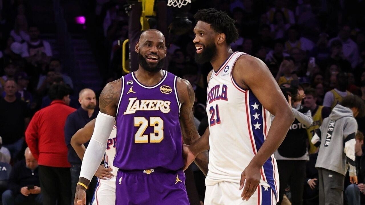 LOS ANGELES, CA - FEBRUARY 5: Joel Embiid #21 of the Philadelphia 76ers and LeBron James #23 of the Los Angeles Lakers smiles before the game on February 5, 2026 at Crypto.Com Arena in Los Angeles, California. NOTE TO USER: User expressly acknowledges and agrees that, by downloading and/or using this Photograph, user is consenting to the terms and conditions of the Getty Images License Agreement. Mandatory Copyright Notice: Copyright 2026 NBAE