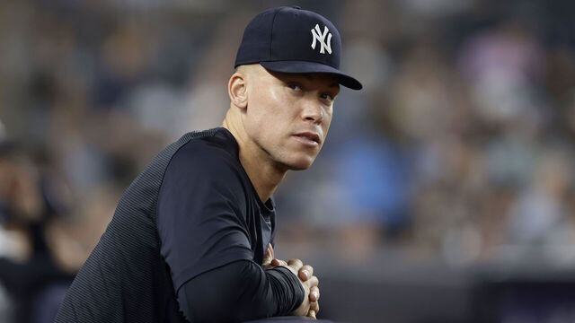 NEW YORK, NEW YORK - JUNE 30: Aaron Judge #99 of the New York Yankees looks on from the dugout during the sixth inning against the Detroit Tigers at Yankee Stadium on June 30, 2026 in New York City.