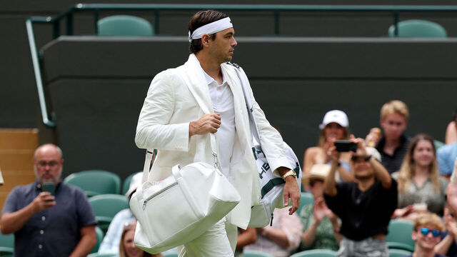 LONDON, ENGLAND - JUNE 30: Taylor Fritz of United States walks onto court for his match against Dusan Lajovic of Serbia during their Gentlemen's Singles first round match on day two of The Championships Wimbledon 2026 at All England Lawn Tennis and Croquet Club on June 30, 2026 in London, England.
