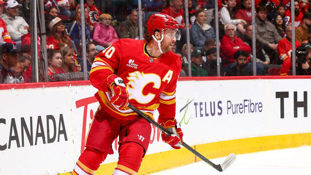 CALGARY, CANADA- APRIL 14: Blake Coleman #20 of the Calgary Flames skates up ice against the Colorado Avalanche at Scotiabank Saddledome on April 14, 2026 in Calgary, Alberta, Canada.