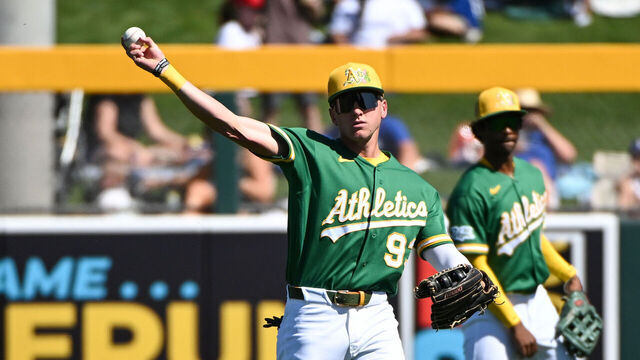 MESA, ARIZONA - MARCH 08, 2026: Ryan Lasko #93 of the Athletics throws to the infield during the second inning of a spring training game against the Los Angeles Dodgers at Hohokam Stadium on March 08, 2026 in Mesa, Arizona.