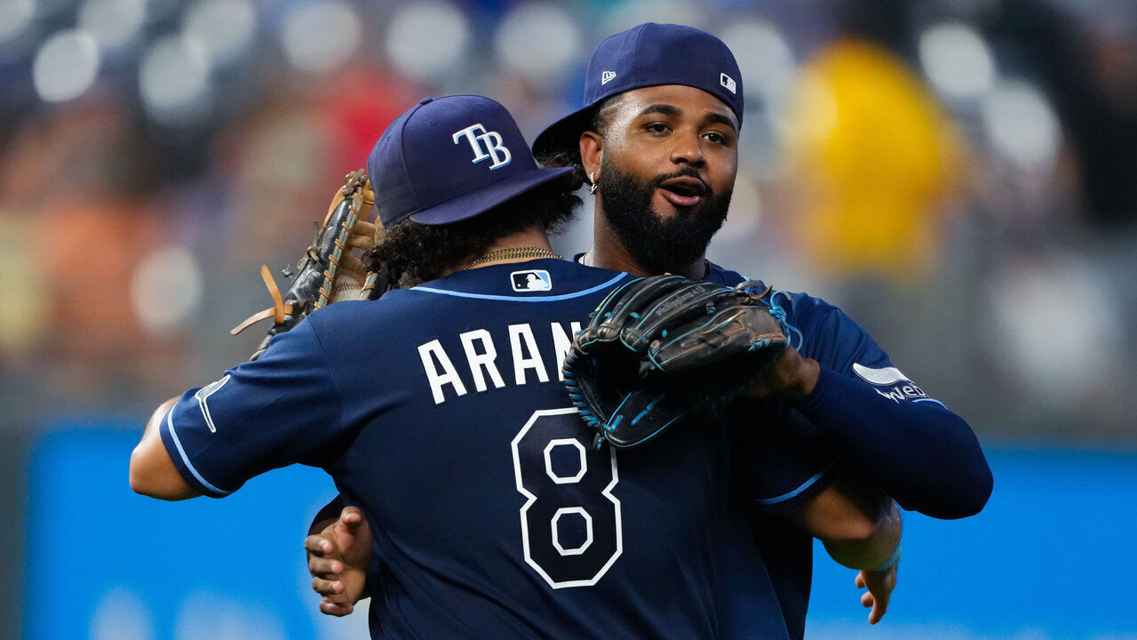 KANSAS CITY, MISSOURI - JULY 02: Jonathan Aranda #8 and Junior Caminero #13 of the Tampa Bay Rays celebrate their team's 5-2 win over the Kansas City Royals at Kauffman Stadium on July 02, 2026 in Kansas City, Missouri.