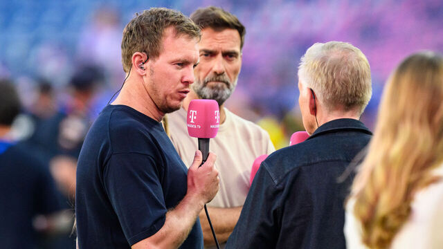30 June 2026, USA, Foxborough: Soccer, Men: World Cup, Germany vs. Paraguay, Knockout Stage, Round of 32, Boston Stadium; German national team coach Julian Nagelsmann (Germany) stands next to Jürgen Klopp (right) during a post-game interview with Magenta TV.ATTENTION: In accordance with FIFA regulations, these images may be used exclusively for editorial purposes. Commercial use is prohibited. Furthermore, no video-like sequences may be created, and no alterations may be made to the image, either in the foreground or the background. Photo: Tom Weller/dpa
