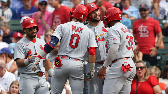 CHICAGO, ILLINOIS - JULY 03: Masyn Winn #0 of the St. Louis Cardinals celebrates his three-run home run with teammates Nelson Velázquez #38, Alec Burleson #41, and José Fermín #15 during the fourth inning against the Chicago Cubs at Wrigley Field on July 03, 2026 in Chicago, Illinois.