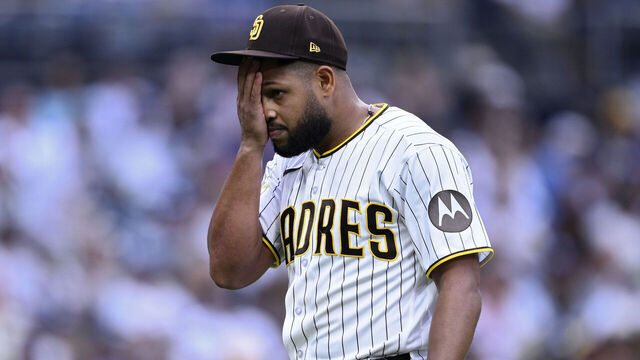 SAN DIEGO, CALIFORNIA - JUNE 27: Randy Vasquez #98 of the San Diego Padres walks to the dugout during the fourth inning against the Los Angeles Dodgers at Petco Park on June 27, 2026 in San Diego, California.